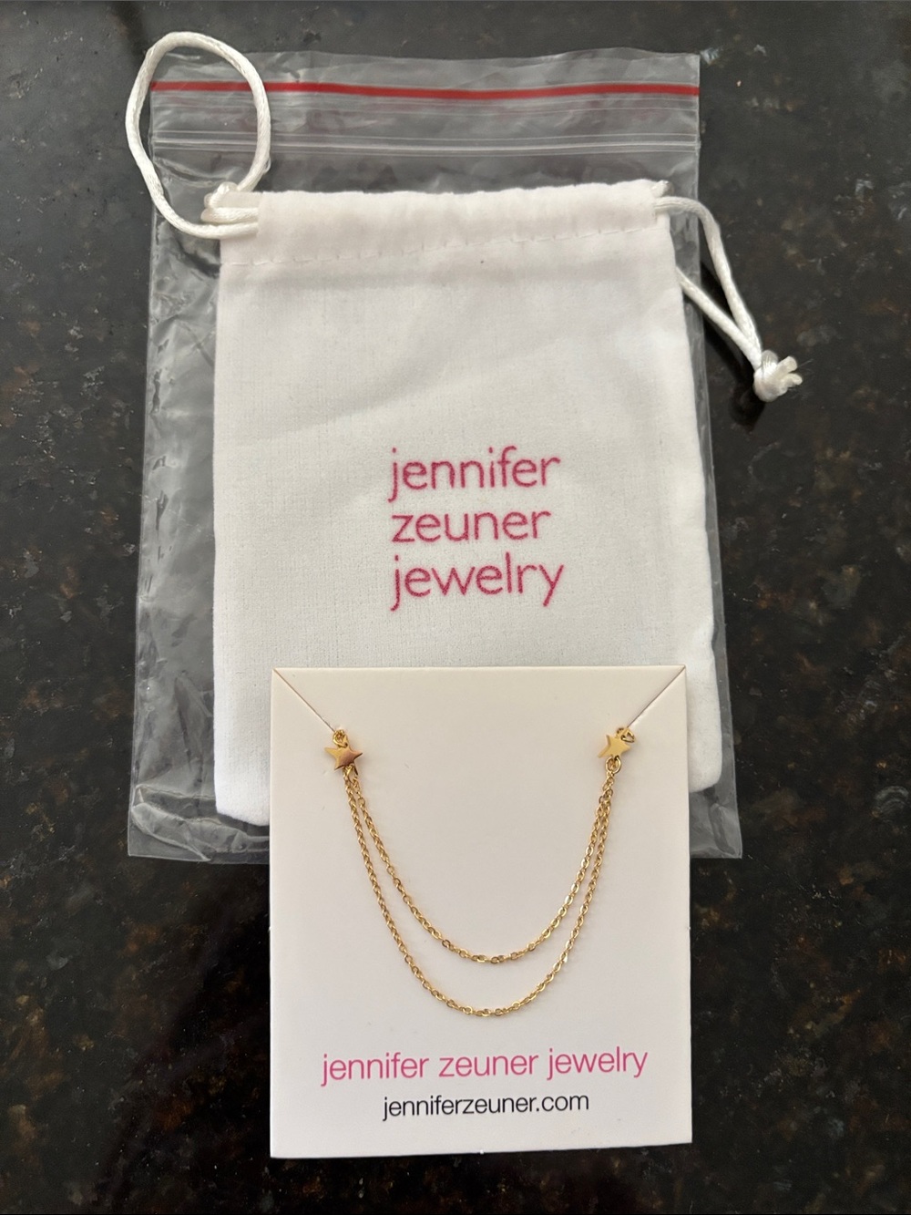 Brand new!  Gold-tone Double Star Necklace